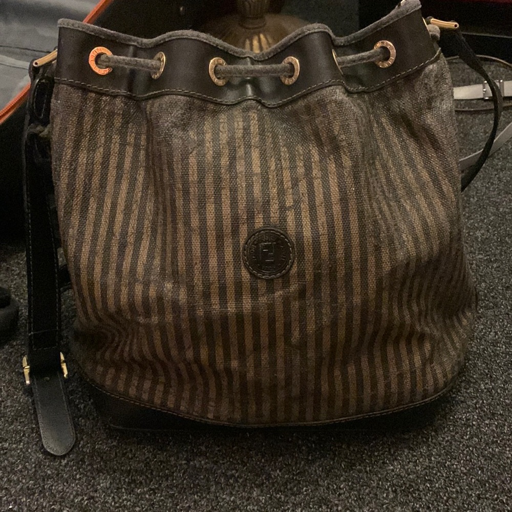 Vintage Fendi Sachel. Worn but still usable with charming details.